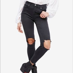 free people black jeans with busted knee